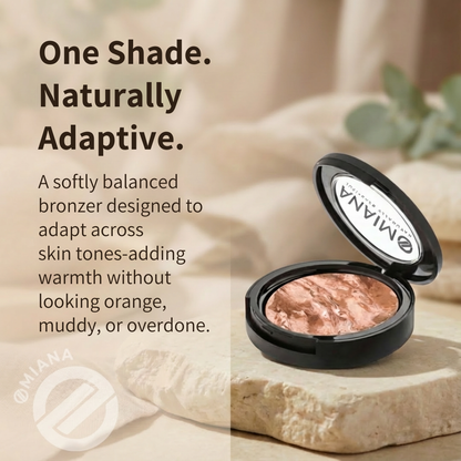 Omiana bronzer compact on a stone with text describing its adaptability.